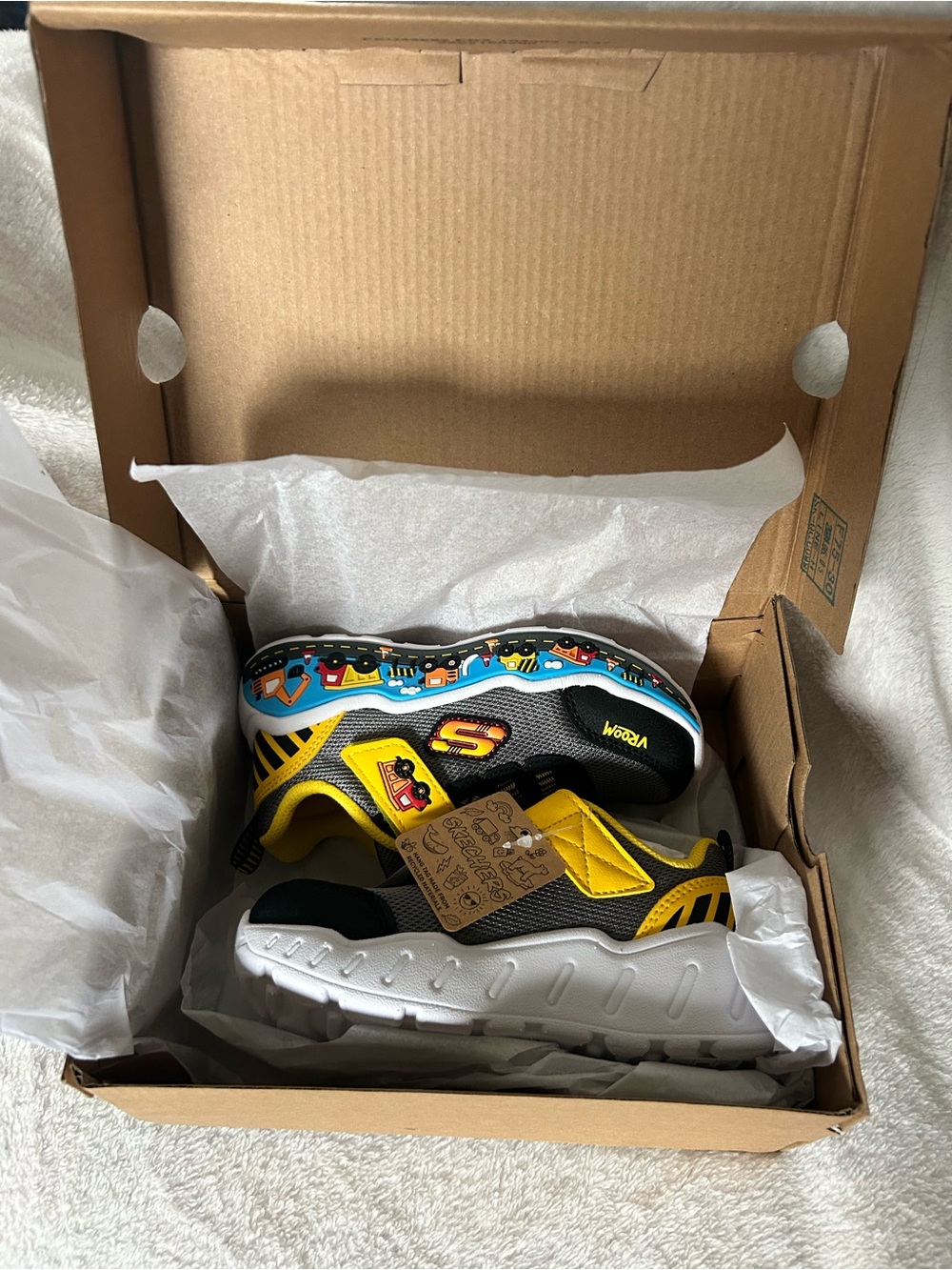 Skechers Kids Black & Yellow Sneakers with Colorful Midsole Construction trucks